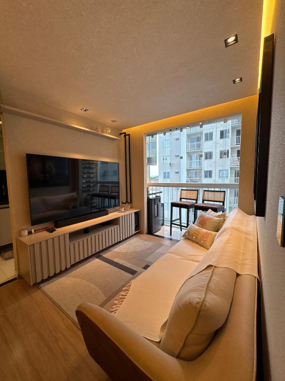 Et tv og/eller underholdning på Apartamento Aracaju