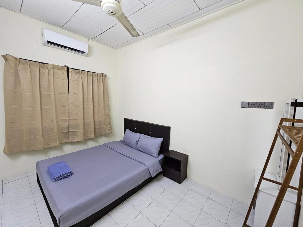 Postel nebo postele na pokoji v ubytování May Flower Hostel