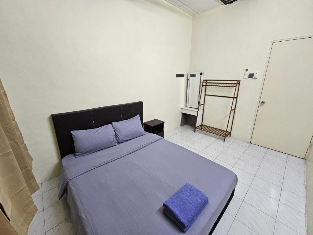 Postel nebo postele na pokoji v ubytování May Flower Hostel