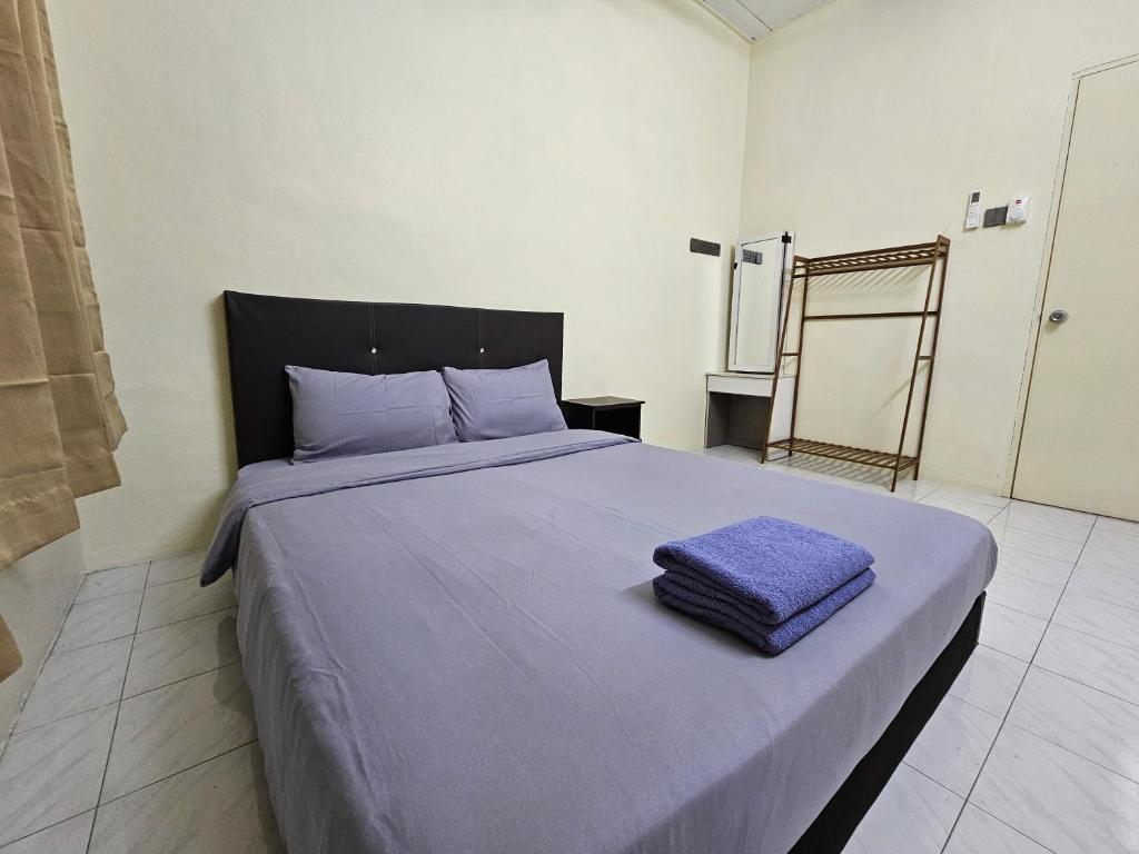 Postel nebo postele na pokoji v ubytování May Flower Hostel