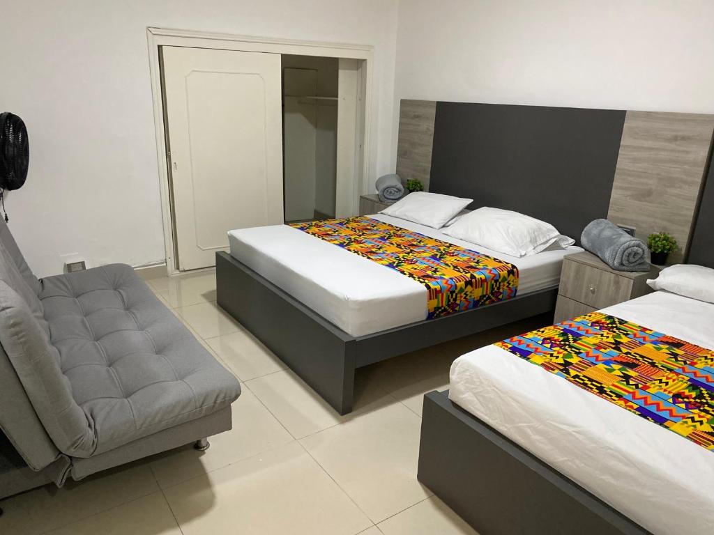 Postel nebo postele na pokoji v ubytování Hotel Ciento Once Boutique Laureles