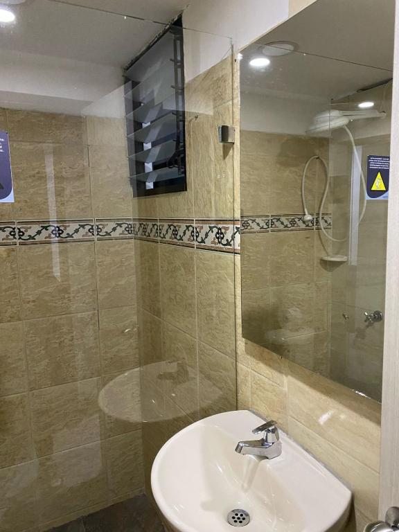 Koupelna v ubytování Hotel Ciento Once Boutique Laureles