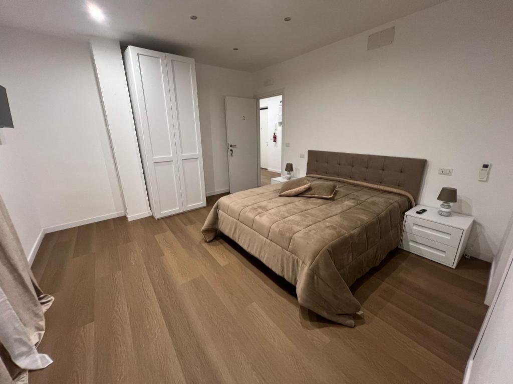 Ένα ή περισσότερα κρεβάτια σε δωμάτιο στο Beb Napoli flegrea