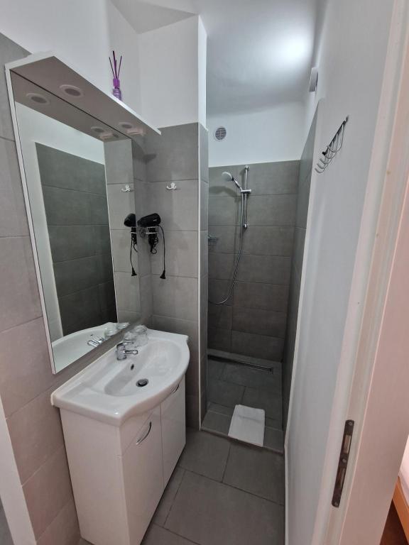 Koupelna v ubytování Počitniški dom Portorož / Portoroz Holiday Home