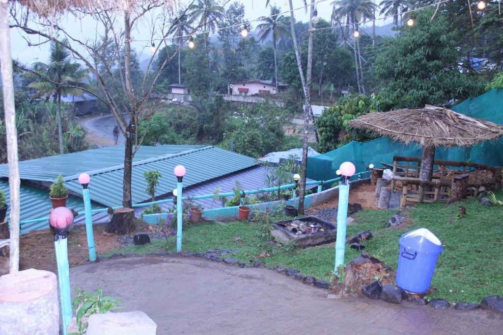 Zahrada ubytování Munnar Kudil Resto Cafe