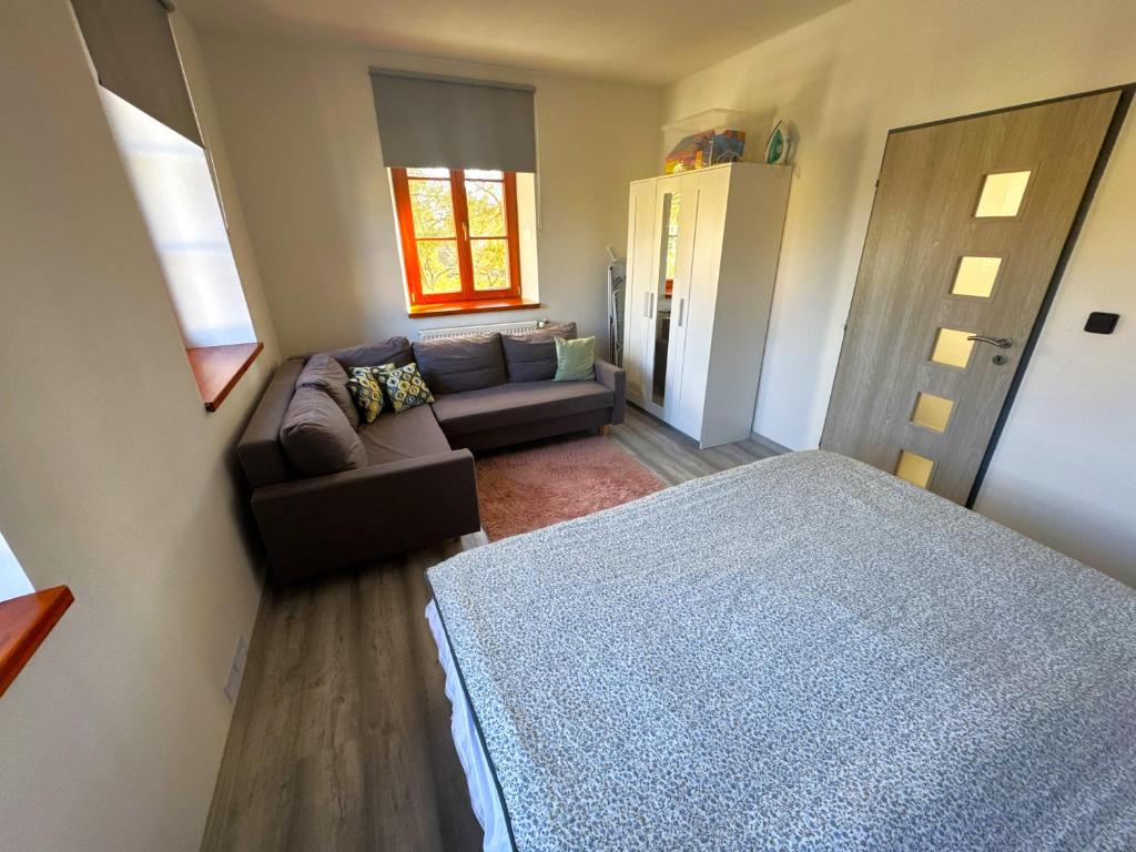 Postel nebo postele na pokoji v ubytování Apartmán Špálovka