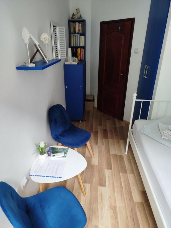 Guesthouse BiT Accommodation tesisinde bir odada yatak veya yataklar