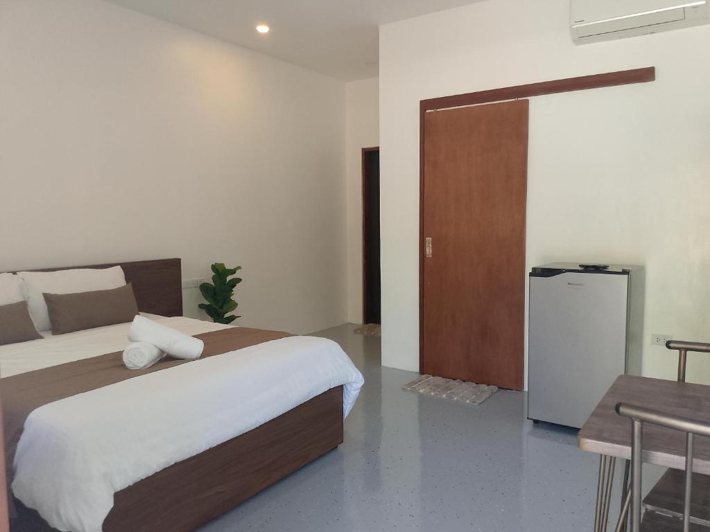 Postel nebo postele na pokoji v ubytování Lulinghayaw Resort-Panglao
