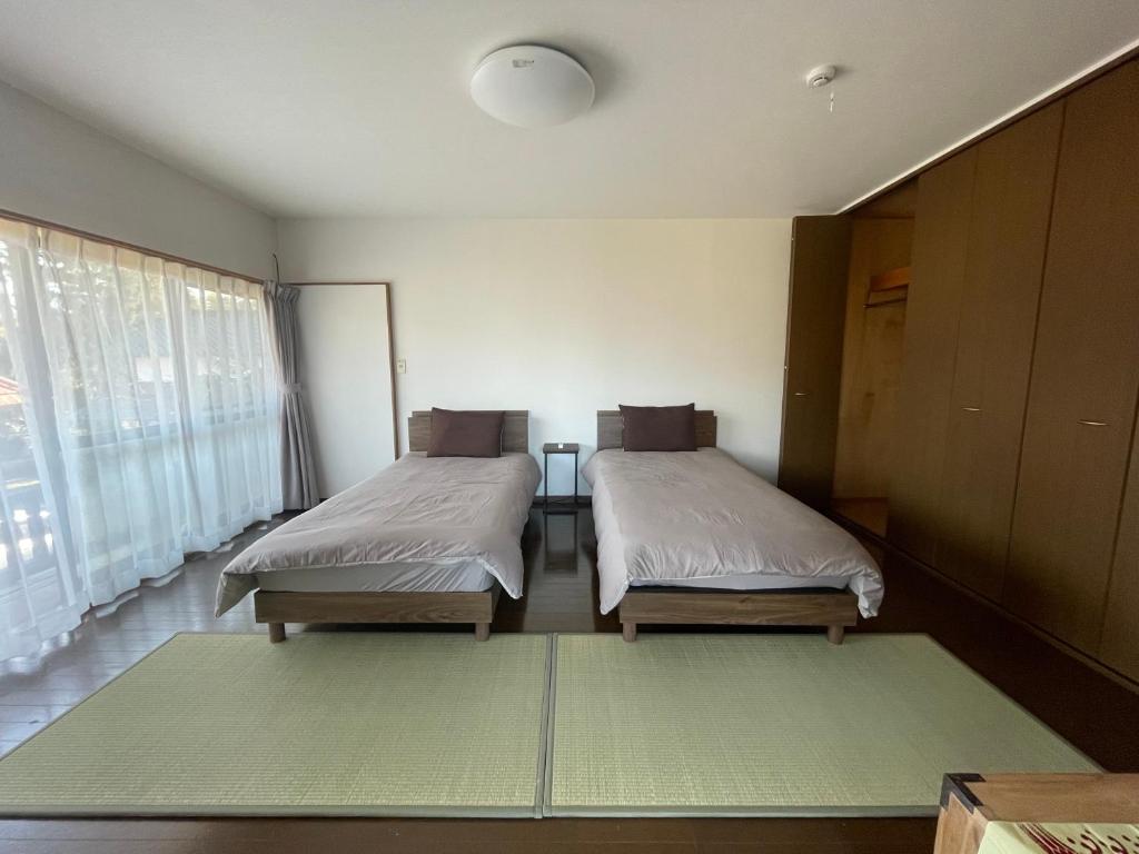 Postel nebo postele na pokoji v ubytování temple stay 玉林寺