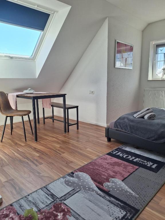 Postel nebo postele na pokoji v ubytování 5-Zimmer Ferienwohnung Welzheimer Wald