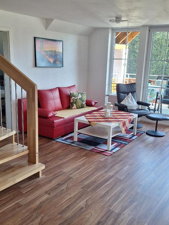 Posezení v ubytování 5-Zimmer Ferienwohnung Welzheimer Wald