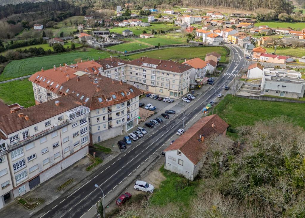 an aerial view of a city with buildings and cars at Vivienda Alló in Rois