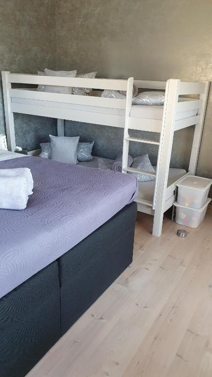 Postel nebo postele na pokoji v ubytování Gästehaus Ferienwohnung Abendstern