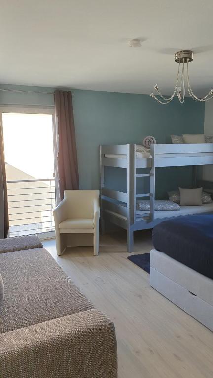 Postel nebo postele na pokoji v ubytování Gästehaus Ferienwohnung Abendstern