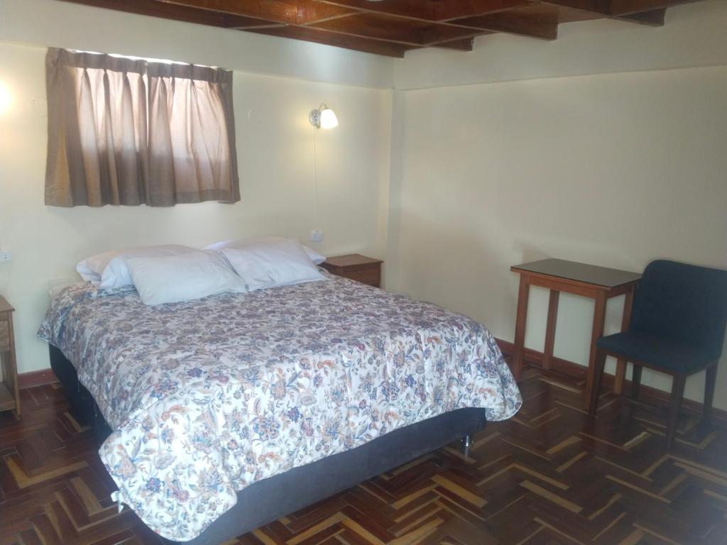Postel nebo postele na pokoji v ubytování Suyay B&B