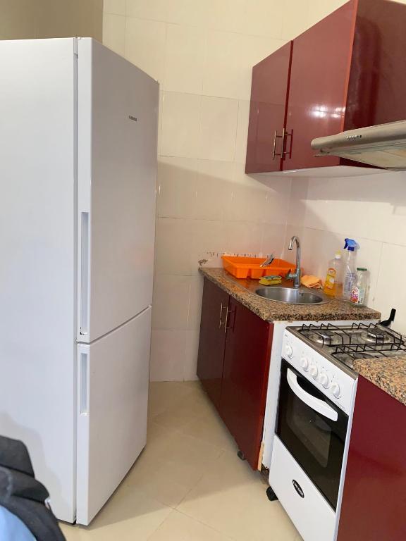 Kuchyň nebo kuchyňský kout v ubytování Tarrafal Paradise Suite