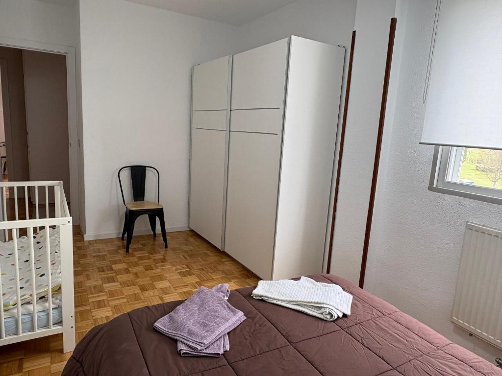 Postel nebo postele na pokoji v ubytování VUT Casa Trujillano