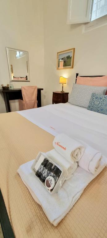 Postel nebo postele na pokoji v ubytování BnB '900 Lecce centro
