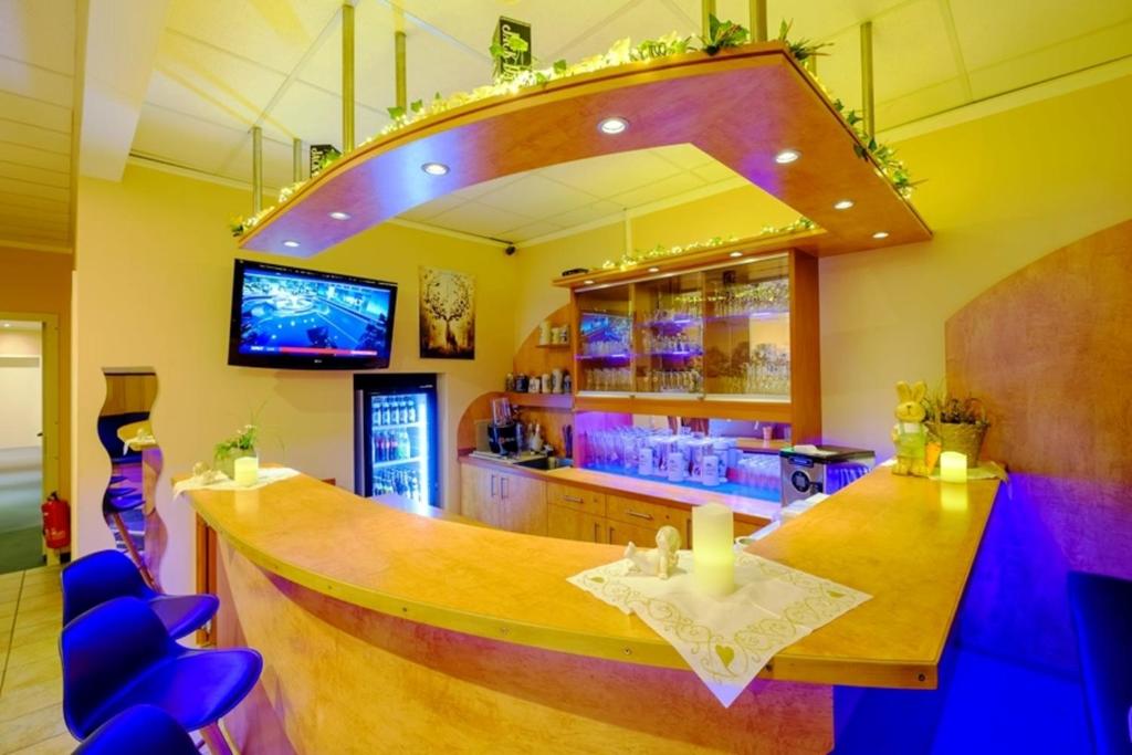 TV a/nebo společenská místnost v ubytování Hotel Thannhof