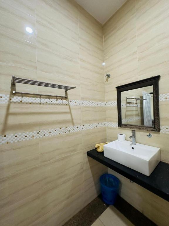 Koupelna v ubytování Maxwell Inn Luxury Hotel