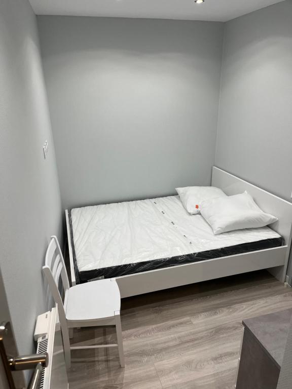 Postel nebo postele na pokoji v ubytování appartement N1