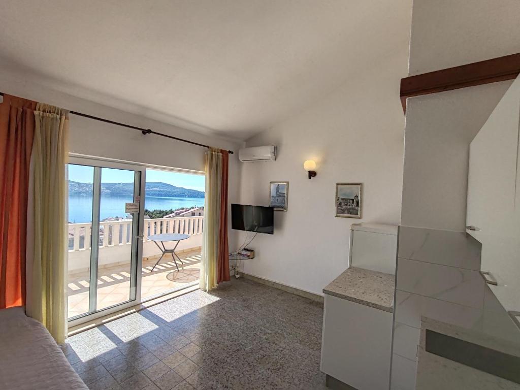 Televízia a/alebo spoločenská miestnosť v ubytovaní Apartment Julio