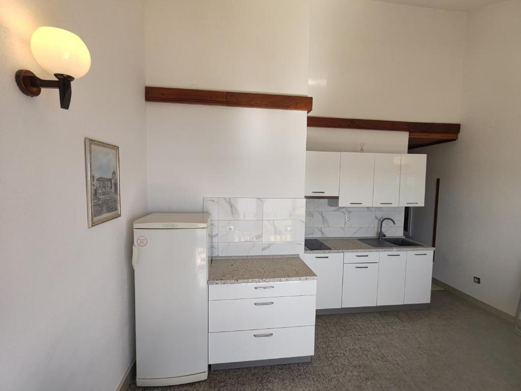 Kuchyňa alebo kuchynka v ubytovaní Apartment Julio