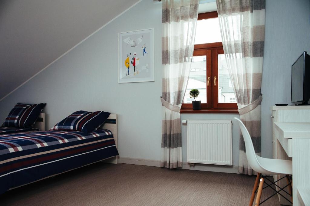 Postel nebo postele na pokoji v ubytování Fresco Hostel