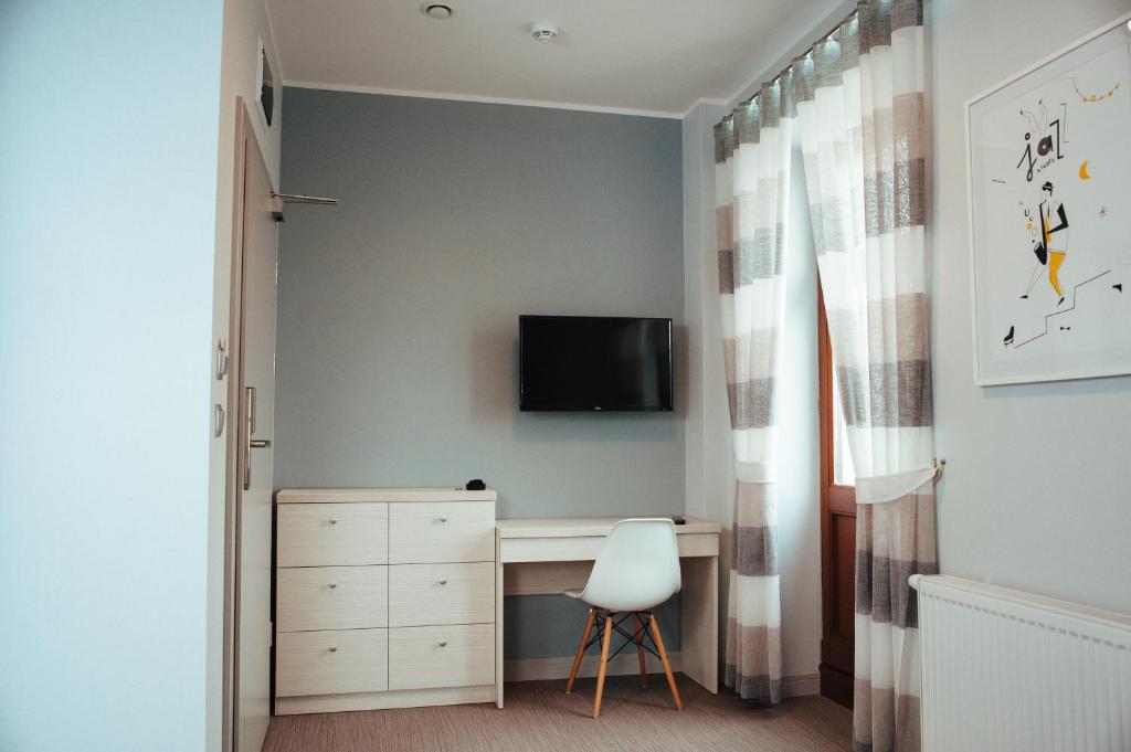 TV a/nebo společenská místnost v ubytování Fresco Hostel