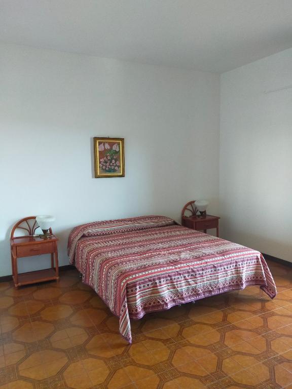 Postel nebo postele na pokoji v ubytování Cinzia House