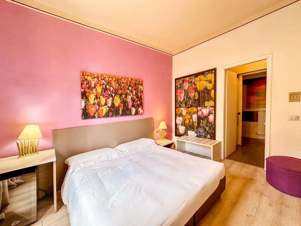 Postel nebo postele na pokoji v ubytování Hotel Alba