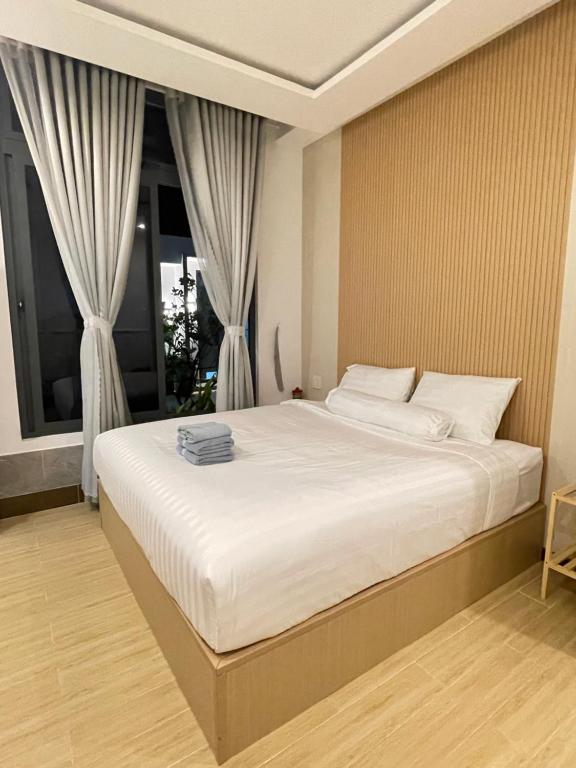 Postel nebo postele na pokoji v ubytování Experience Homestay