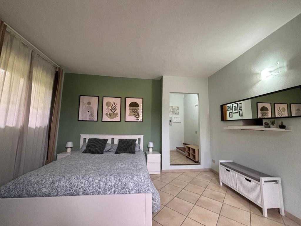 Postel nebo postele na pokoji v ubytování Casa di Greve