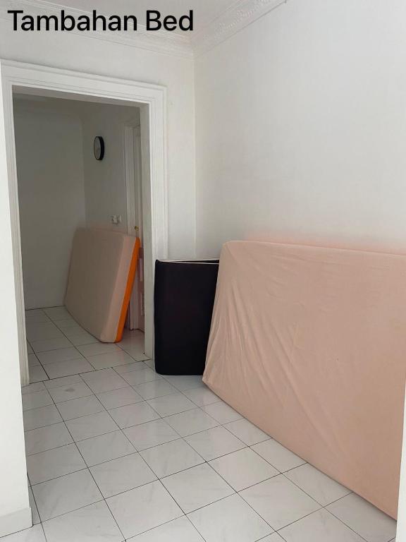 a room with a table with a sheet on it at Via puncak resort in Cikundul