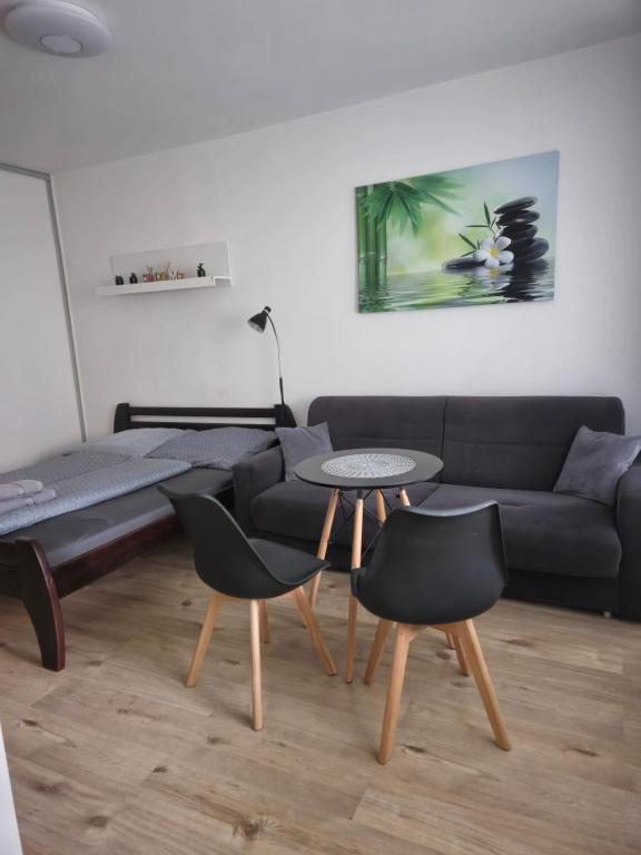A seating area at Apartment Klimka with balcony, free wifi and free parking