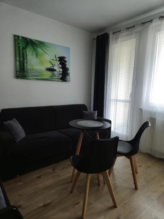 A seating area at Apartment Klimka with balcony, free wifi and free parking