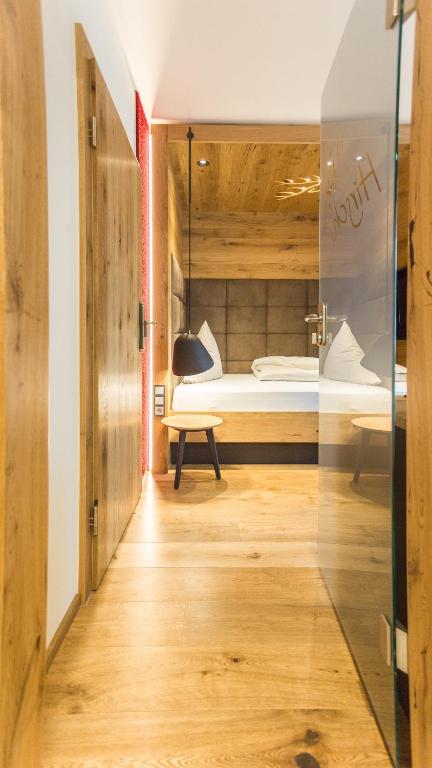 Postel nebo postele na pokoji v ubytování Hotel Hirsch