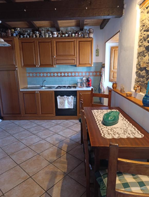 Kuchyň nebo kuchyňský kout v ubytování Rustico la Tavernetta
