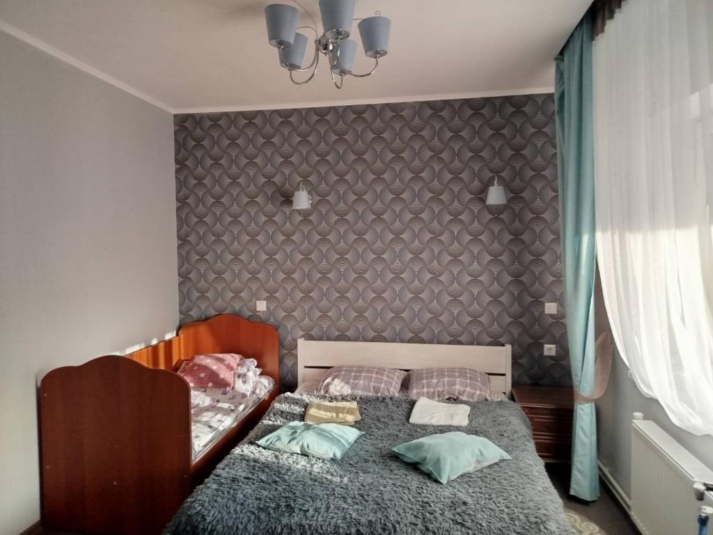 Postel nebo postele na pokoji v ubytování Gorec
