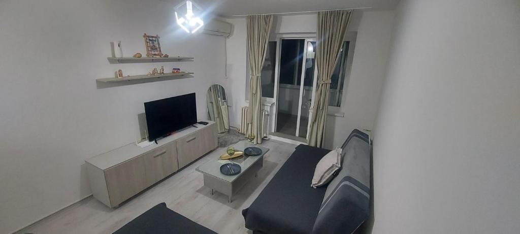 TV a/nebo společenská místnost v ubytování K3 Apartment