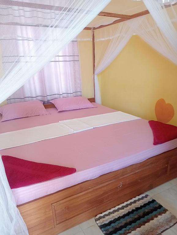 Postel nebo postele na pokoji v ubytování Benzai Surf