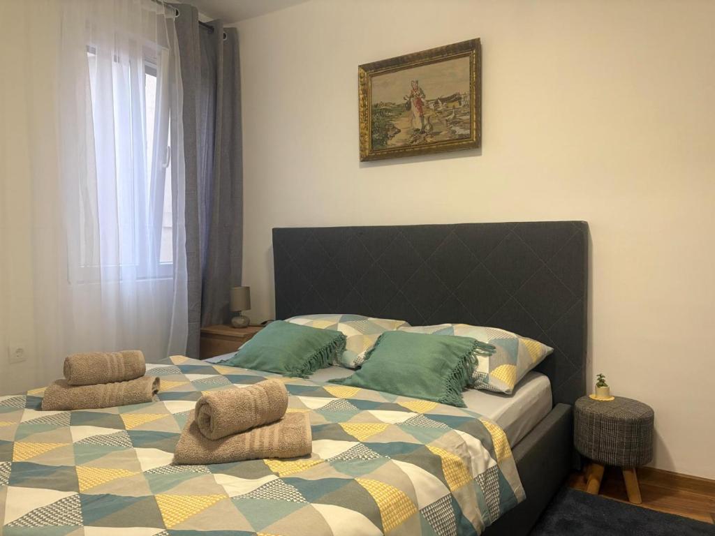 Posteľ alebo postele v izbe v ubytovaní MINT APARTMENTS 2