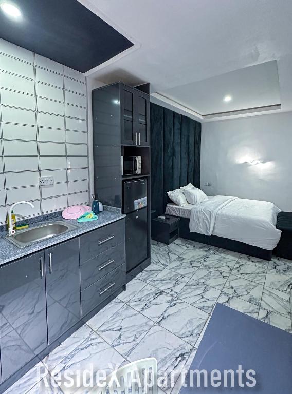 Kuchyň nebo kuchyňský kout v ubytování ResideX Apartment