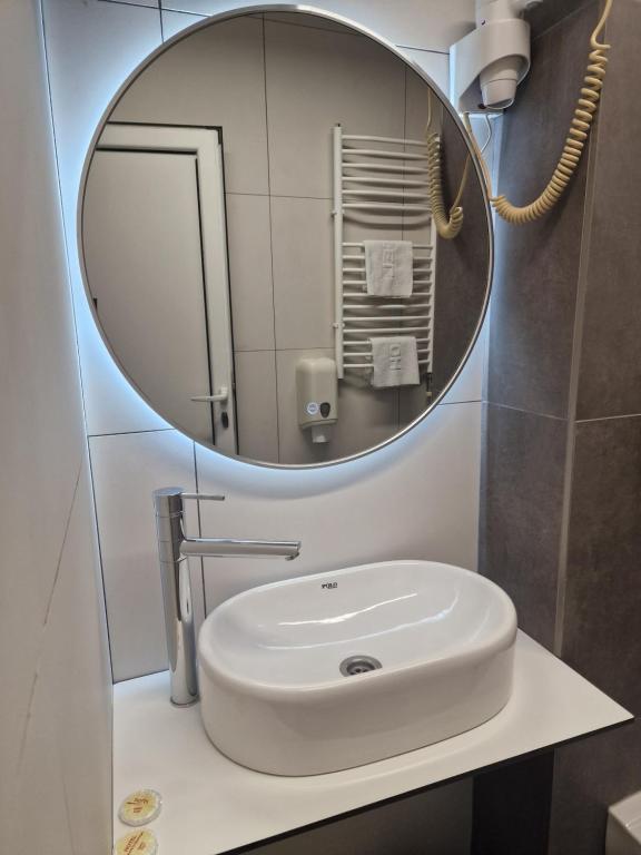 Koupelna v ubytování Hotel S