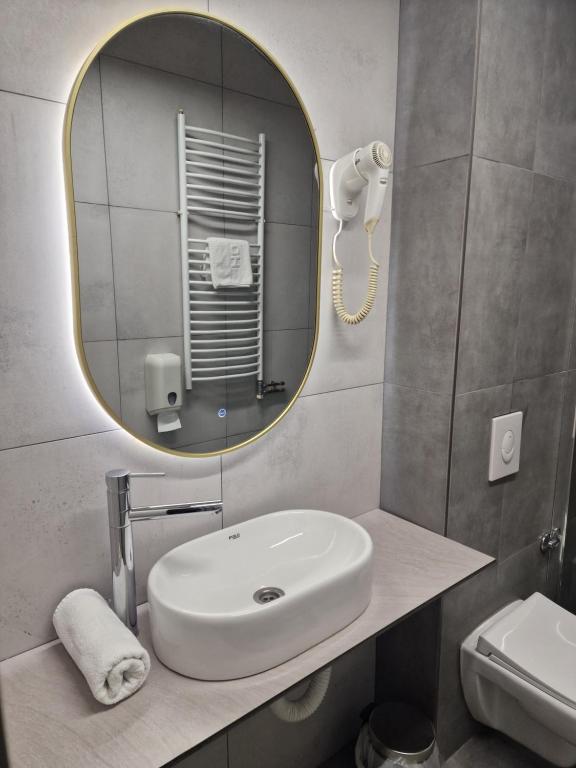 Koupelna v ubytování Hotel S