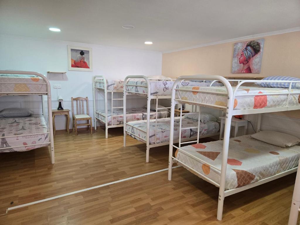 Postel nebo postele na pokoji v ubytování Guest House Pereira
