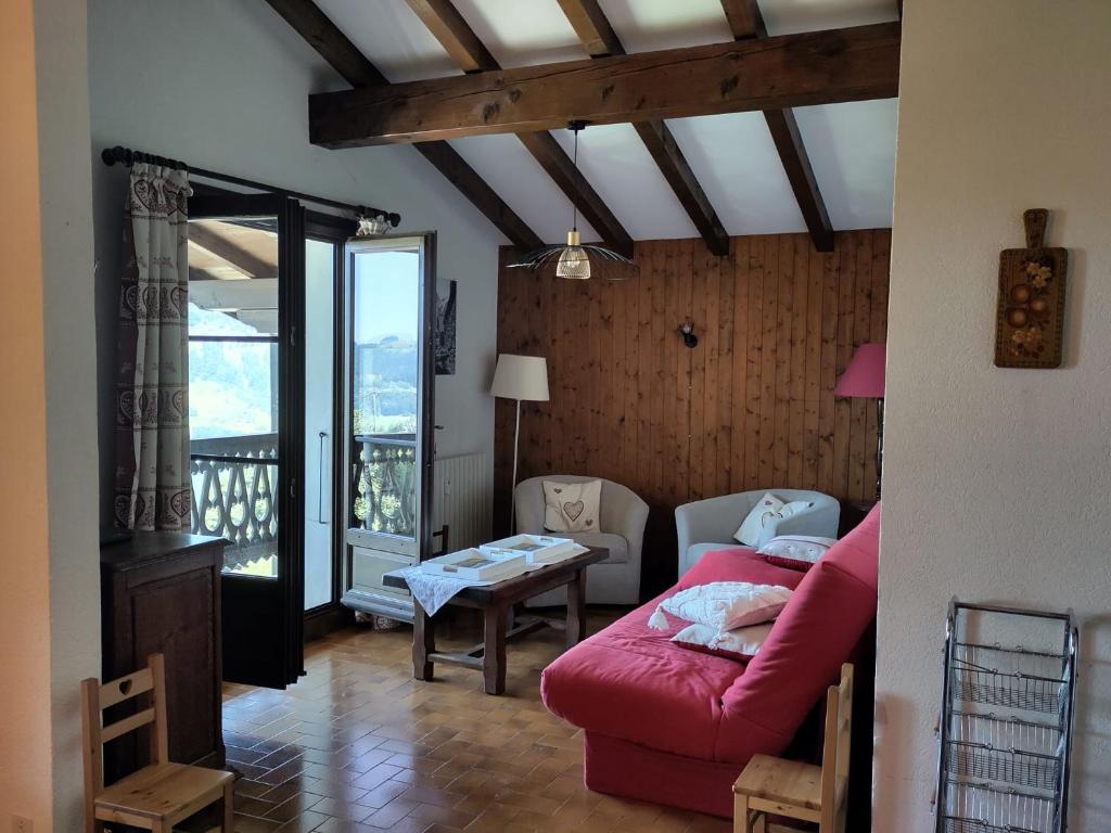 Ένα ή περισσότερα κρεβάτια σε δωμάτιο στο Grand appartement 6 personnes