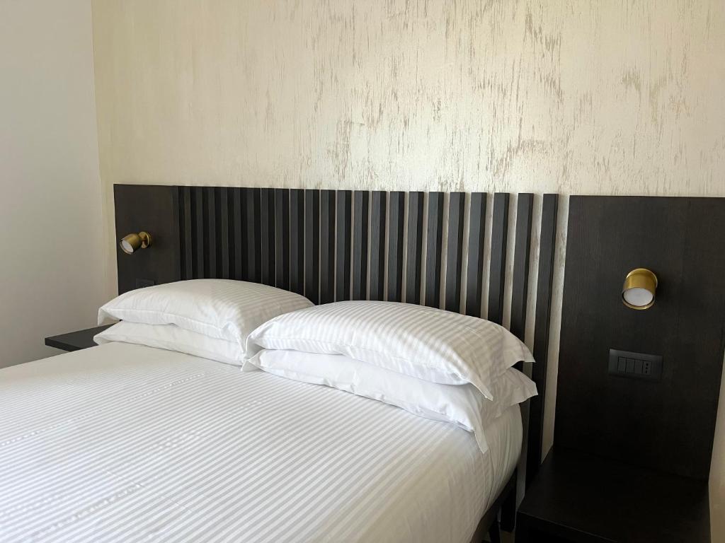 Postel nebo postele na pokoji v ubytování SambuRoom B&B