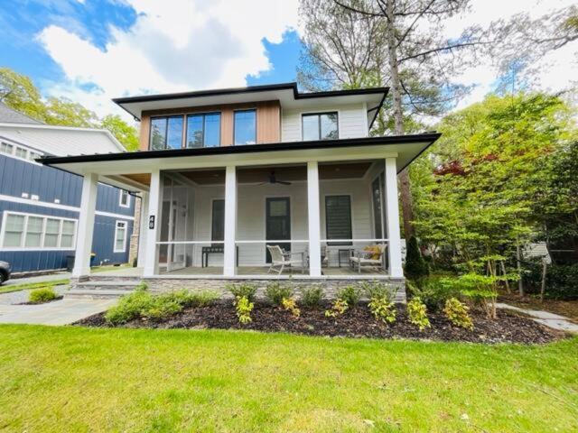 a large house with a porch and a lawn at Columbia avenue 48 in Rehoboth Beach