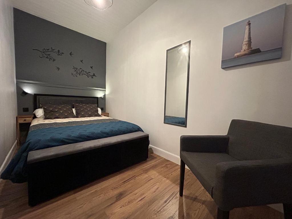 Postel nebo postele na pokoji v ubytování L'Amphore du clos de Bigos